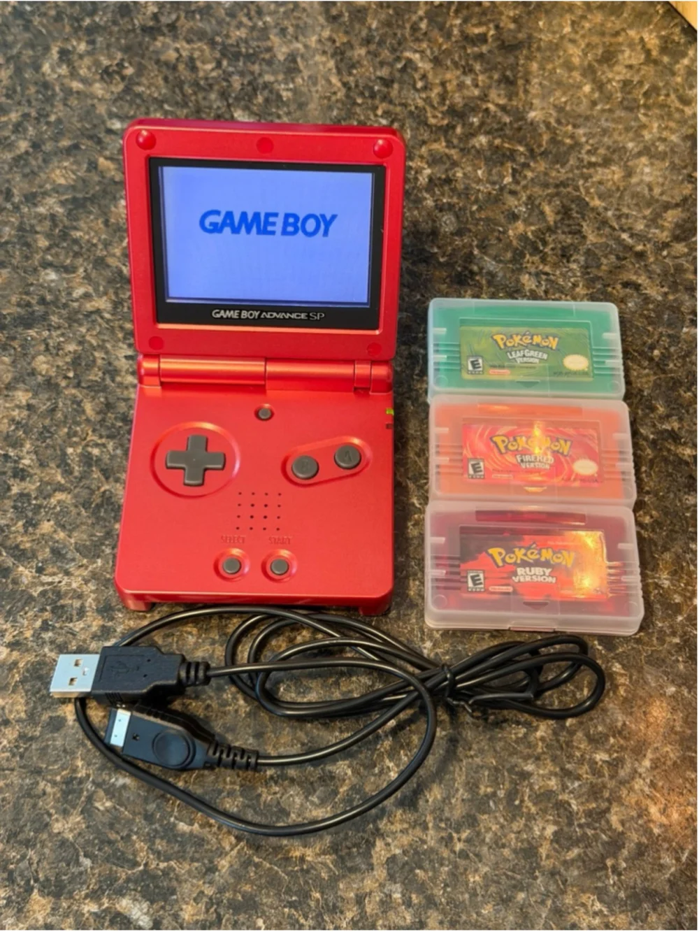 Nintendo Game Boy Advance SP & 3 Pokemon Games